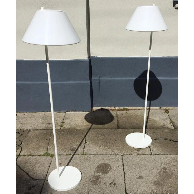 - A pair of Combi floor lamps - Designed by Danish architect Per Iversen in 1967 - Manufactured by Louis Poulsen in...