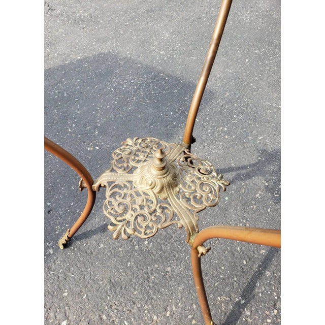 Meticulously carved iron with natural stone top lamp table or plant stand for indoor or outdoor use. Removable stone top....