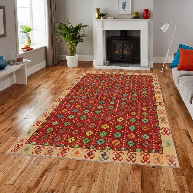 This stunning hand-knotted Afghan Balouchi rug is a captivating addition to any decor. Crafted by skilled artisans, it...