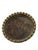 7" diameter hand hammered brass ring tray with faux tortoise shell interior featuring and decorative balls around the...