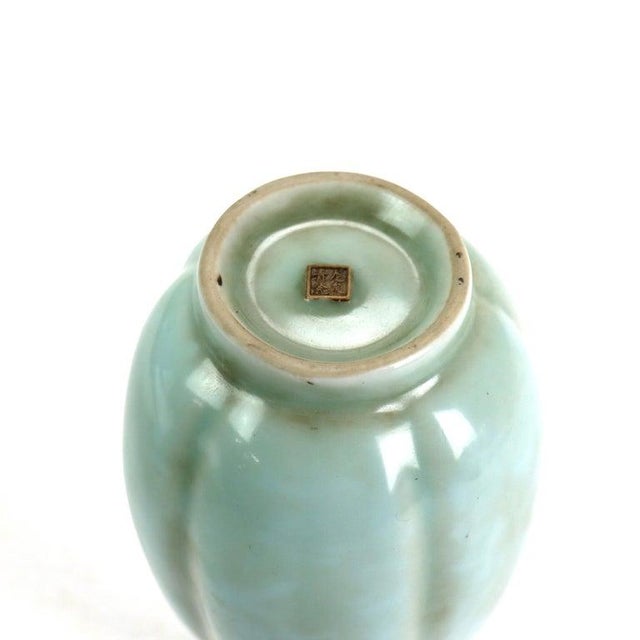 Chinese Celadon Porcelain Melon Ribbed Vase Signed 20thC Measures - 8 1/2" x 3 3/8" x 3 3/8" A Chinese celadon porcelain...