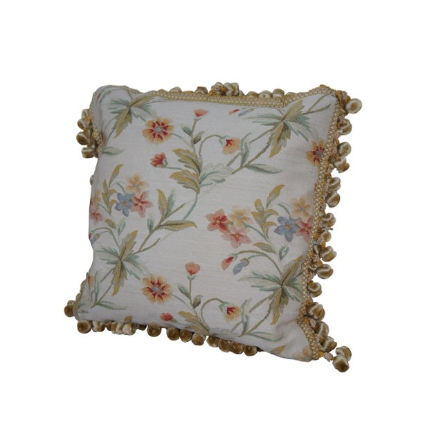 2 Available - 20th century square throw pillow, embroidered in silk with an array of cream, rusty pink, and blue flowers...