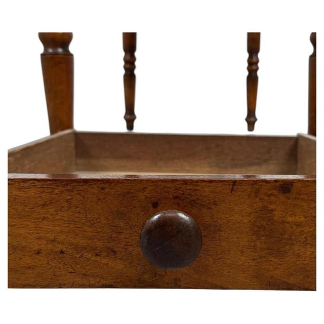 A handsome 19th-century English side table, finely crafted from mahogany and characterised by its restrained design,...