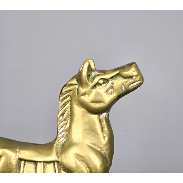 A medium size rocking horse. It shows white natural patina, could be cleaned. Size: 6 3/4" long, 1 1/2" wide, 5 1/2" tall...