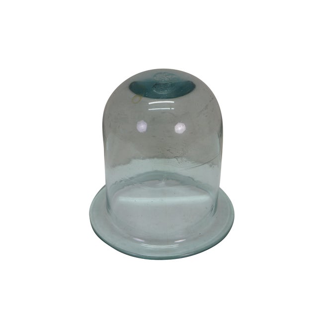Vintage aqua green glass cloche / bell dome. It features a slight green tint in the glass, characteristic of hand-blown...