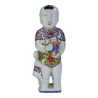 Antique 18th Century Chinese Kangxi Porcelain Figure of a Ho Ho Boy Holding a Vase With Child at His Feet in Famille Rose Palette For Sale