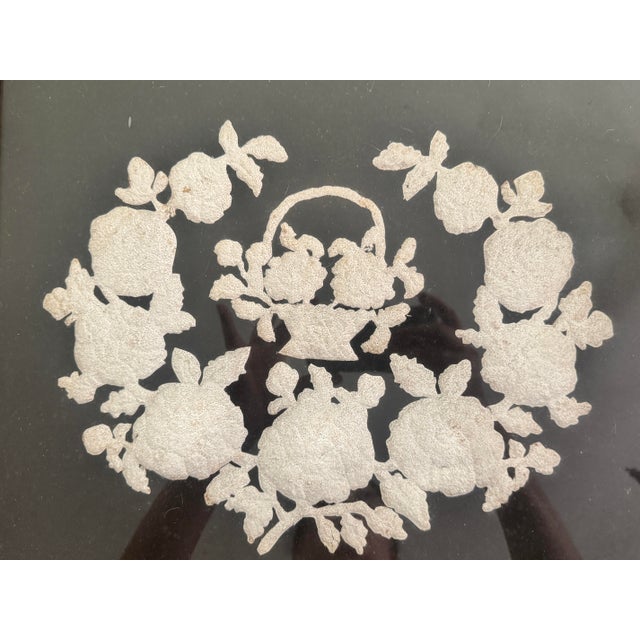 Listing is for a primitive piece of what I believe to be pin prick art. The basket of flowers with raised floral design is...