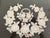 Listing is for a primitive piece of what I believe to be pin prick art. The basket of flowers with raised floral design is...