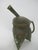 Chinese antique vessel, a replica of an ancient Chinese ritual wine vessel, deeply oxidized bronze with an incised...