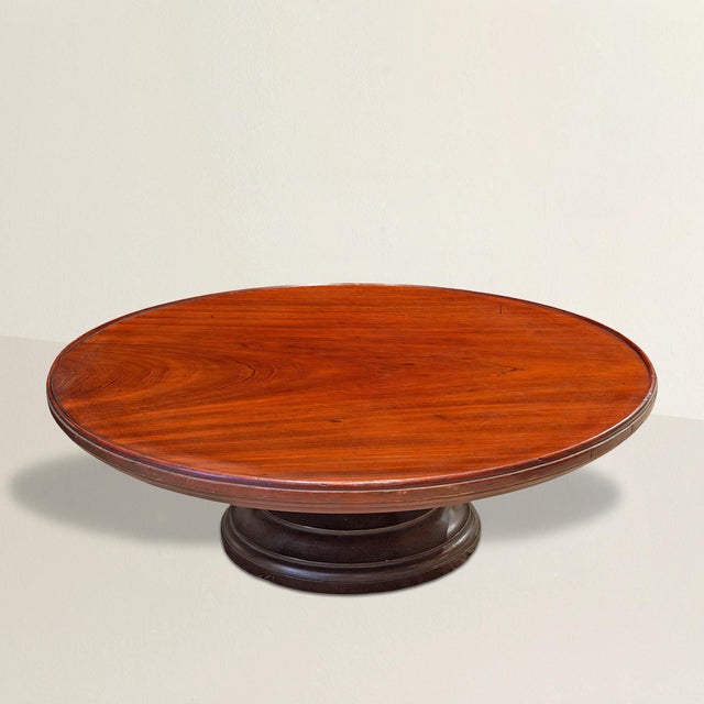 There is a particular elegance in objects that do one thing—and do it beautifully. This 19th-century English lazy Susan is...