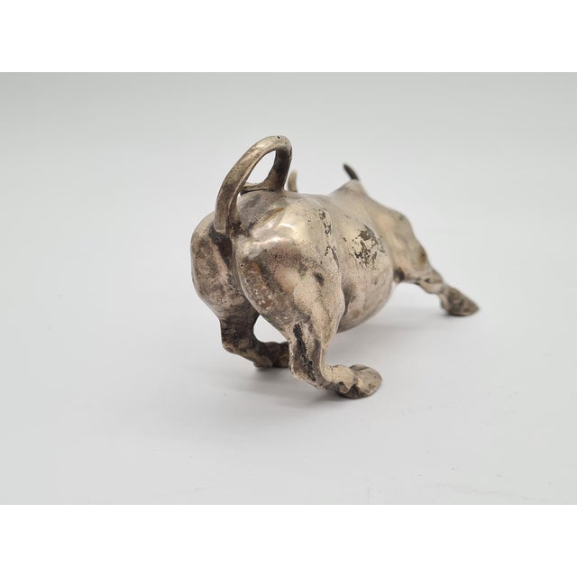 Charging Bull Figurine in Bronze by A. Di Modica, 1980s., in Very Good conditions. Designed 1980 to 1989 This piece is...