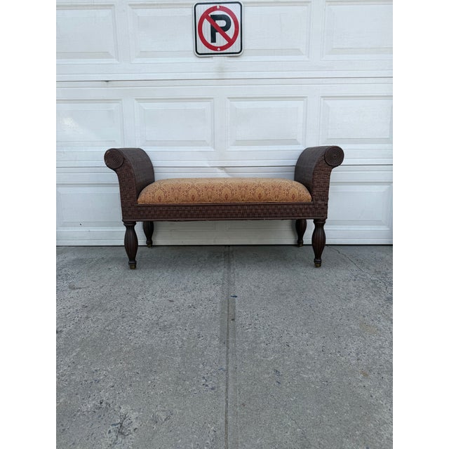 We have an absolutely stunning vintage boho rattan bench for sale. It features woven wicker construction, dramatic scroll...