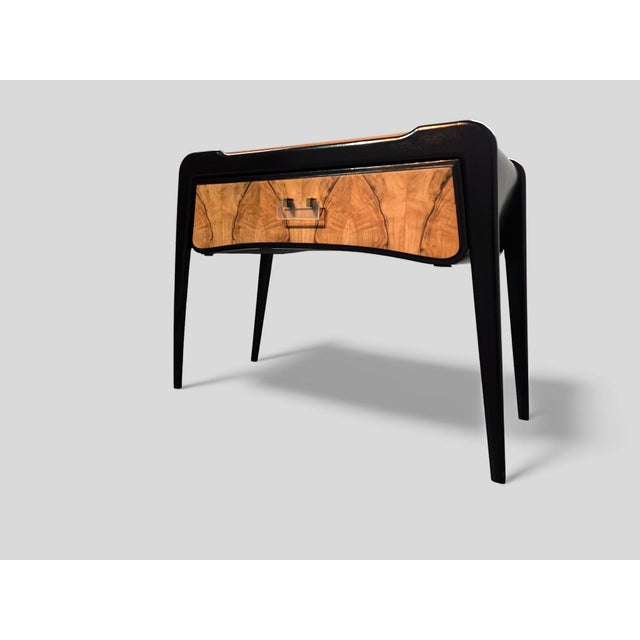 Elegant Italian Art Deco Coffee Table characterized by the pleasant contrast between the ebonized part and the walnut...