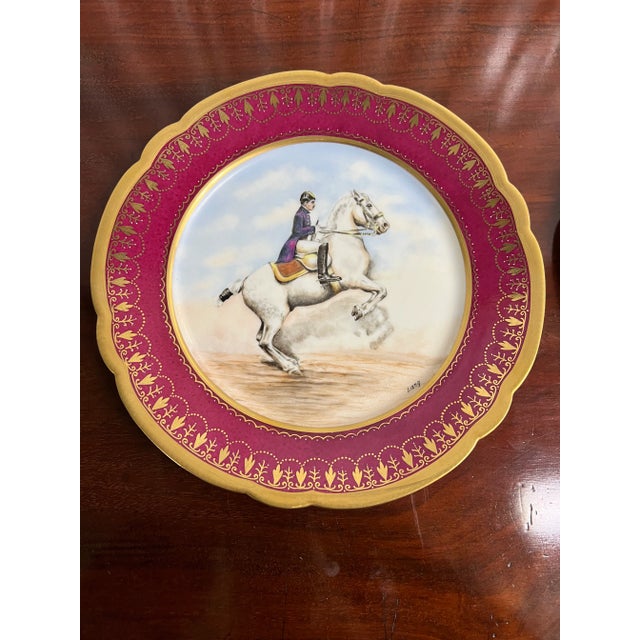 A fabulous pair of c. 1870 french porcelain plates by Ch. Pillivuyt - very rare with opposing horseback scenes. Each...