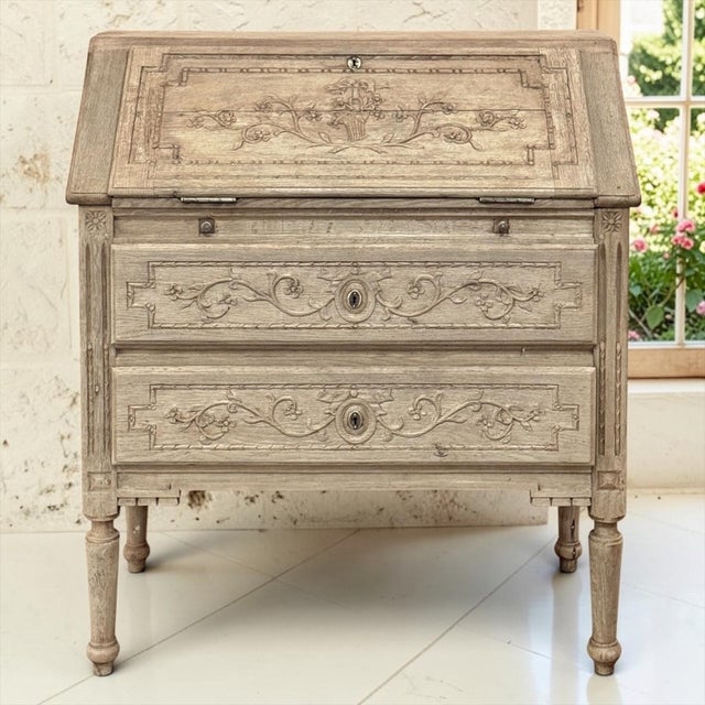 An exceptional 18th century French Louis XVI period secretary crafted from solid oak and now presented in a beautifully...