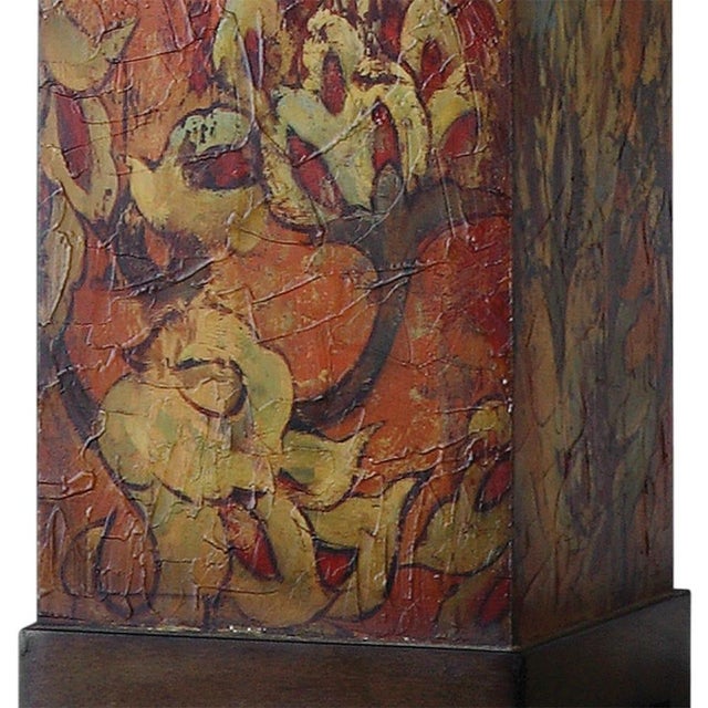 Colorful flower pattern Tea Tin base with burnished walnut finished details. The rectangle bell shade is an ivory linen...