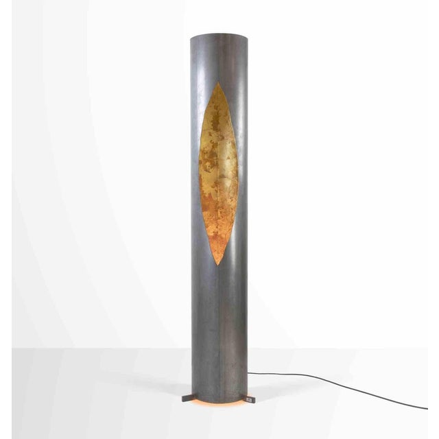 Vintage Floor Lamp Model "Colonna" is a design lamp realized by Catellani & Smith in 1995. Painted metal floor lamp...
