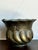 Introduce a touch of timeless European elegance to your home with this exquisite Vintage Italian Hammered Brass Planter....
