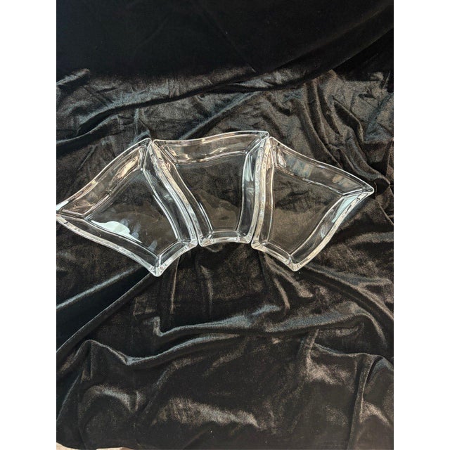 Elevate your dining presentation with this sophisticated Luigi Bormioli 3-piece puzzle serving set. Crafted by the...