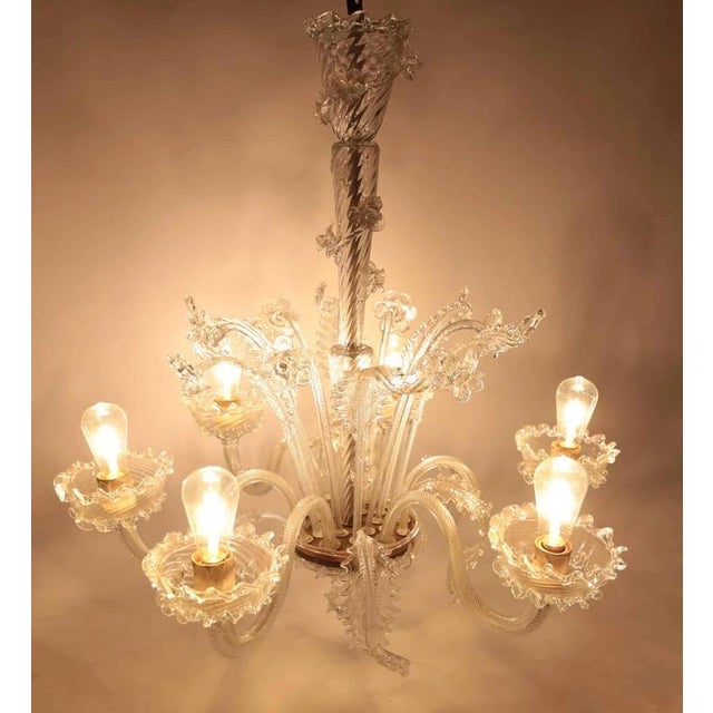 Beautiful venetian murano chandelier with floral decoration. The chandelier has new wiring and a new power cable. Very...