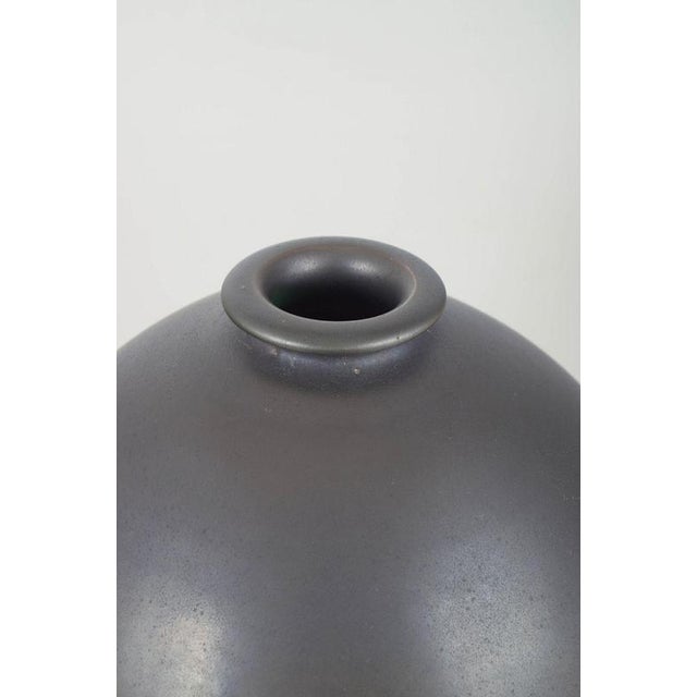 Mobach, Holland Monumental Vase, 1970s. Monumental hand-glazed stoneware vase with a deep matte slate-grey surface and...
