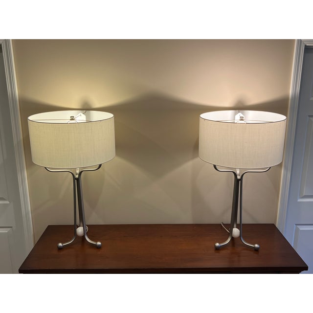 Baker's Larimar Table Lamp from the Jean Louis Denoit Collection. Features include a 3-leg tapered lamp column fabricated...