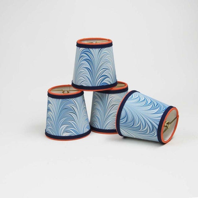 Designer marble lampshades will transform any light fixture. Marbled flame pattern. Trimmed with two colors of grosgrain....