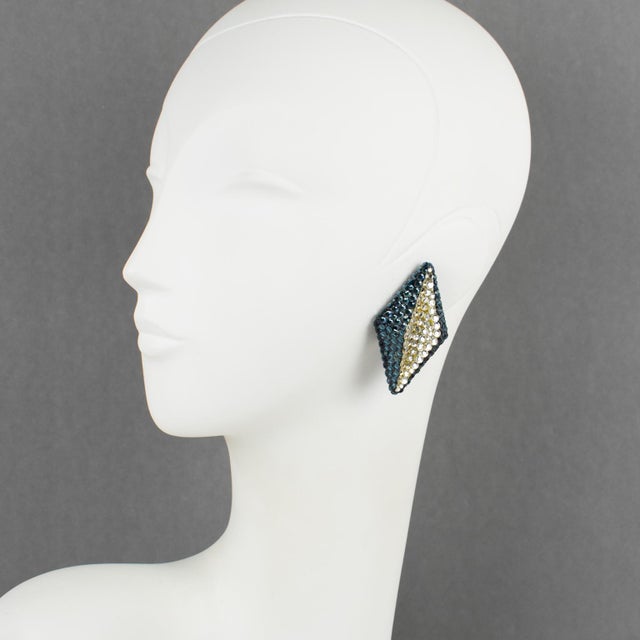 Richard Kerr designed those gorgeous statement clip-on earrings in the 1980s. The brand signature rhinestone paved design...