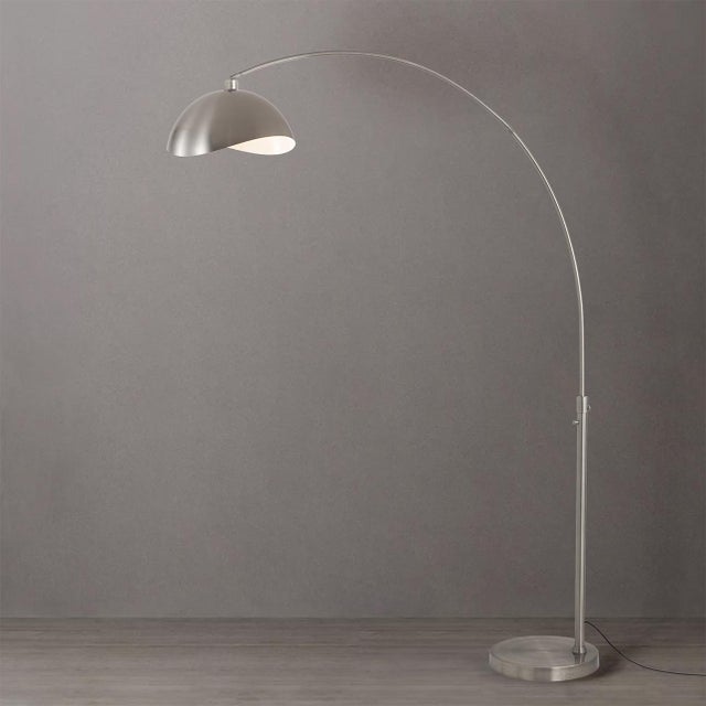 The Luna Bella is a Modern arc lamp in NOVA's lighting line, featuring a sleek satin nickel finish and a stable satin...