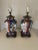 Pair of Japanese Imari style table lamps, with a brass fittings and mahogany mounts. New brass finials and harps. In...