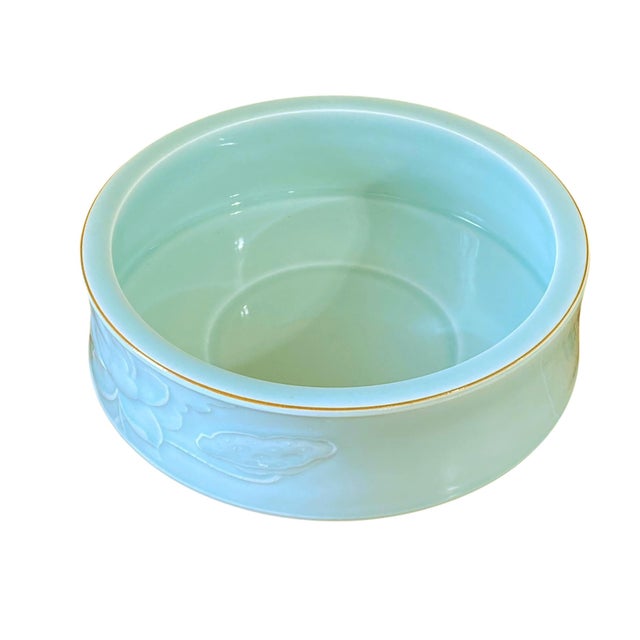 This exquisite elegant celadon bowl features intricate hand-carved high relief &nbsp;lotus flowers, symbolizing good...