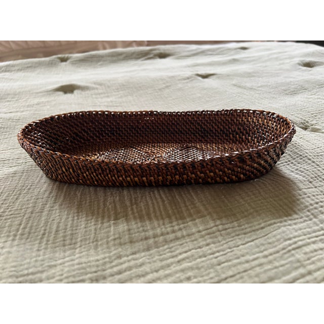 This great basket is medium to dark in color and is a good size for dinner rolls or desky things It is an art piece in...