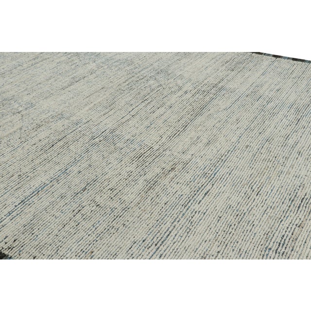 Handwoven in wool, this 10x11 contemporary Kilim is an exciting addition to both the Kilim & Flat Weave and Textural rug...