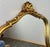 This elegant Vintage French wall mirror features a beautifully shaped gilt composite frame with flowing curves and ornate...