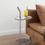 The design of this side table captures both form and function. The oval stainless steel frame features a handle-like...