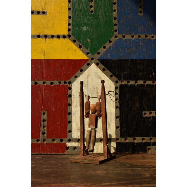 Vintage Folk Art Acrobat Whirligig, Circa 1st-Half 20th Century. This delightful kinetic toy is constructed from carved...