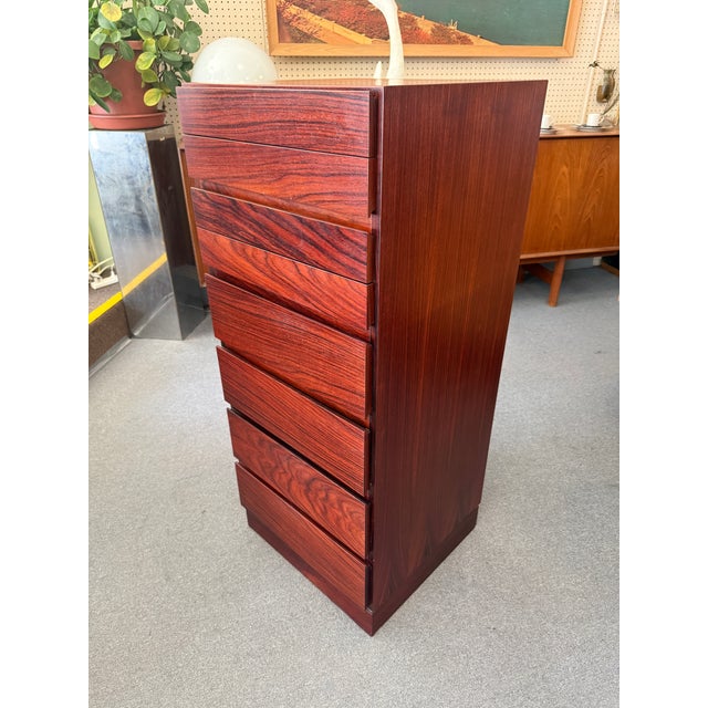 You are viewing a handsome Danish Rosewood 8 Drawer Narrow Chest/Lingerie Chest, designed by Arne Wahl Iverson for Vinde...