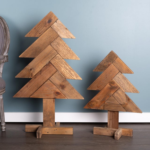 Add a touch of rustic charm to your holiday decor with this set of Wooden Pine Trees! Crafted from solid pine wood with a...