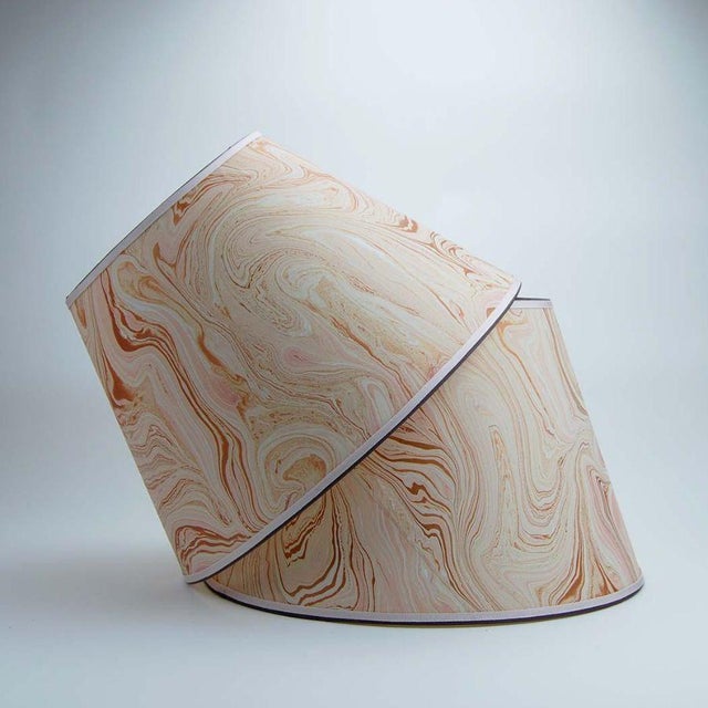 Marbled paper with wonderful rose gold swirl and trimmed in two tones of grosgrain. Available in 3 sizes: 8” x 12” x 8.75”...