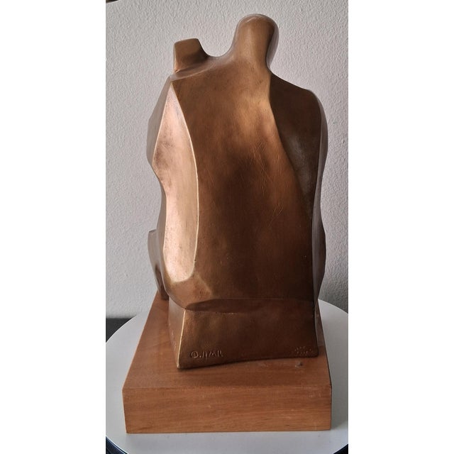 "The Musician" (also commonly referred to as or featuring "The Original Cellist") is an iconic abstract bronze sculpture...