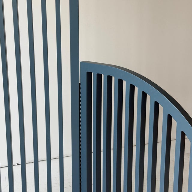 c. Unknown. Large MDF room divider perfect for layering/dividing a large space.