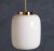 Beautiful pendant lamp in white glass and shiny top in brass. Made in Denmark around the 1960s. The lamp is in great...