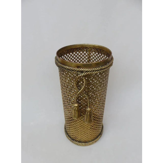 An elegant umbrella stand from the 60 years in the Hollywood Regency style, made in Italy by Li Puma, Firenze. He is below...