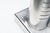 This sculptural table lamp is a refined expression of modernist lighting design. Crafted from brushed stainless steel, the...