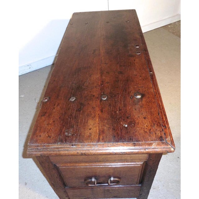 A heavy French panelled oak coffer, 1800 The chest has 2 moulded panels on the front and 1 more on each side with a...