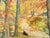 Signed in lower right, but unidentified. This luminous autumnal woodland scene captures a winding country path that cuts...