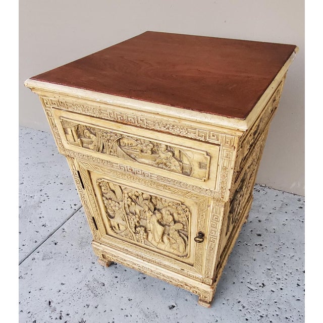 Antique Chinese Wooden Bedside Cabinet with Intricately Carved Chinese Scenery. Beyond The Decorative Carvings The...