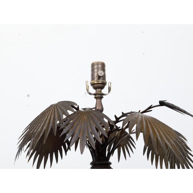 A pair of French bronze palm tree table lamps from circa 1920 on octagonal bases, rewired for the USA. This exquisite pair...