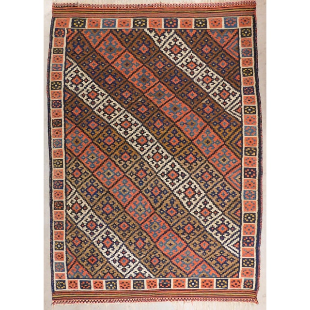 Multi color stripes decorated with geometric motifs. Wool texture on cotton foundation.