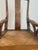 Chinoiserie Mid 20th Century Chinese Hardwood Yoke-Back Rocking Chair With Cane Seat For Sale - Image 3 of 6